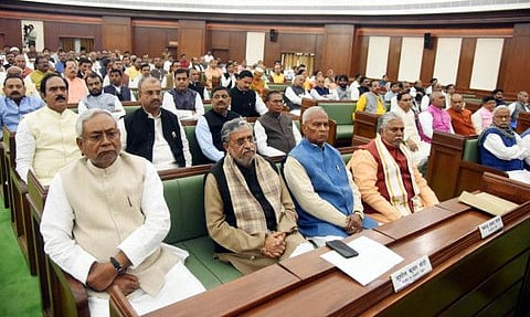 Bihar Chief Minister Nitish Kumar with Deputy CM Sushil Kumar Modi and party legislators at a joint session of the Bihar Assembly Budget session in Patna on Monday.