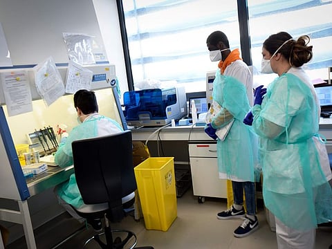 Medical staff from the IHU (Institut Hospitalo-Universitaire) Mediterranee Infection Institute at work in the laboratory to analyse samples on the possible presence of the Covid-19 on Wednesday in Marseille. The Mediterranee infection Institute in Marseille based in La Timone Hospital is at the forefront of the prevention against coronavirus in France.