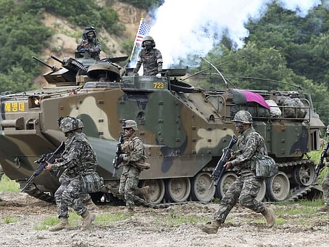 South Korea and US marines participate in a joint military exercise between South Korea and the United States in Pohang, South Korea in 2016. The US and South Korean militaries, used to being on guard for threats from North Korea, face a new and formidable enemy that could hurt battle readiness: a virus spreading around the world that has infected more than 1,200 people in South Korea.