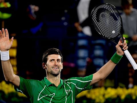 Novak Djokovic celebrates his quarter-final win against Karen Khachanov on Thursday