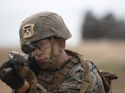 A US soldier aims his gun during the joint military exercise titled "Cobra Gold" on Hat Yao beach in Chonburi province, eastern Thailand, in 2020. The Global Firepower ranking, published on January 6, 2023, placed the United States military as the world’s strongest, followed by Russia, China, India and the UK.