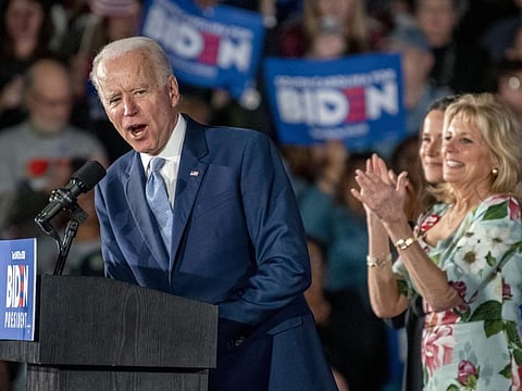 Democratic presidential candidate and former Vice-President Joe Biden speaks as his wife Jill Biden, far right, and daughter Ashley stand by during his primary election night rally in Columbia on Saturday after winning the South Carolina primary.