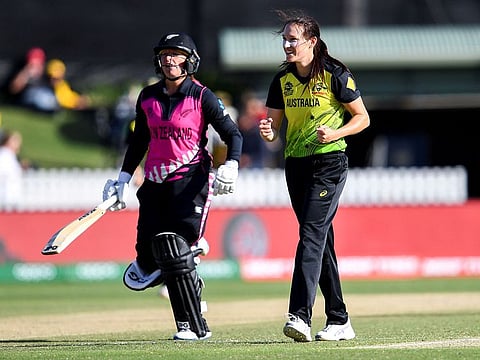 Australia's Megan Schutt (R) celebrates dismissing New Zealand's Hayley Jensen (L) in their Twenty20 women's World Cup cricket match in Melbourne on March 2, 2020.
