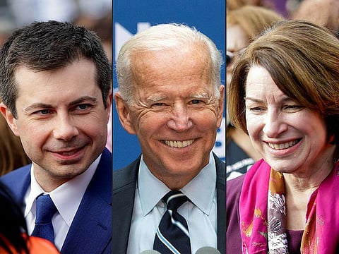 Joe Biden (c) with Pete Buttigieg (l) and Amy Klobuchar.