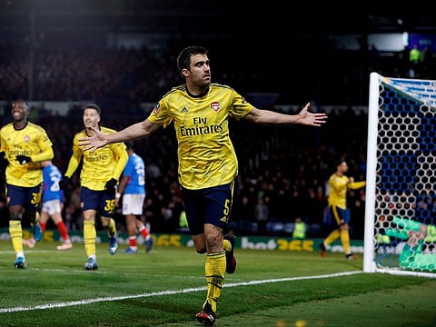 Arsenal's Sokratis Papastathopoulos celebrates scoring their first goal