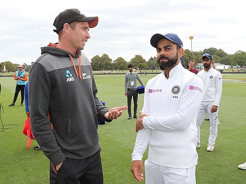 Tim Southee and Virat Kohli