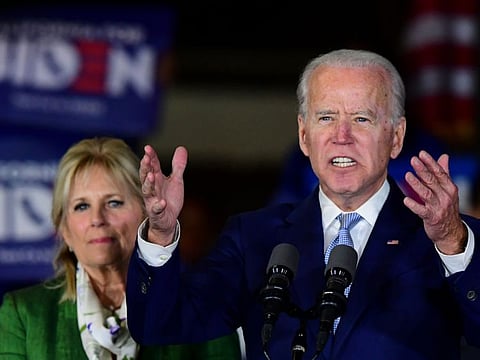 Democratic presidential hopeful former Vice-President Joe Biden accompanied by his wife Jill Biden, speaks during a Super Tuesday event in Los Angeles on Tuesday.
