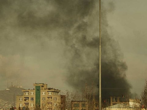 Smoke rises from the site of a gun attack in Kabul on March 6, 2020.