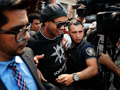 Former Brazilian soccer star Ronaldinho leaves the attorney general office in Asuncion, Paraguay