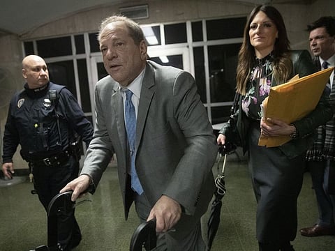 Harvey Weinstein leaves a Manhattan courthouse followed by his his lead attorney Donna Rotunno in the first day of jury deliberations in his rape trial, Tuesday, Feb. 18, 2020, in New York. (AP Photo/Mary Altaffer)