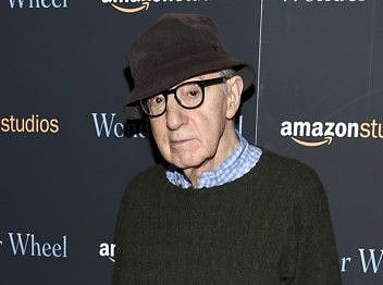 FILE - In this Nov. 14, 2017 file photo, director Woody Allen attends a special screening of "Wonder Wheel" in New York. On Friday, April 12, 2019, an Amazon lawyer said the filmmaker breached his four-movie deal with the online giant by making statements about the #MeToo movement that damaged prospects for promoting his films. Attorney Robert Klieger told a Manhattan federal judge that the company protected itself after Allen made comments that at a minimum were insensitive. (Photo by Evan Agostini/Invision/AP, File)