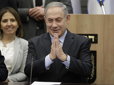 Israeli Prime Minister Benjamin Netanyahu gestures during a meeting with his nationalist allies and his Likud party members at The Knesset - Israeli Parliament in Jerusalem