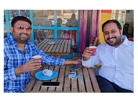 Harvinder Singh Mangat and Ashwaini Sharma enjoy a cup of refreshing tea.