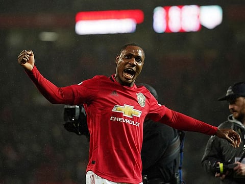 Manchester United's Odion Ighalo celebrates after the English Premier League soccer match between Manchester United and Manchester City