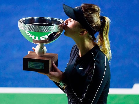 Elina Svitolina kisses the trophy after winning the Monterrey WTA Open women's final