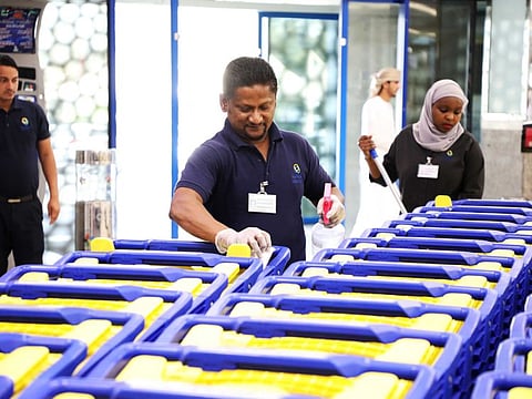 Caption: UAE retail chains are ensuring safety of customers by sanitising trolleys, shopping carts and common touch points.