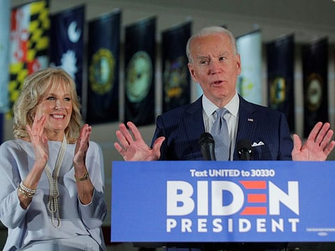 Democratic US presidential candidate and former Vice-President Joe Biden speaks with his wife Jill at his side during a primary night speech at The National Constitution Center in Philadelphia, Pennsylvania, on March 10, 2020.