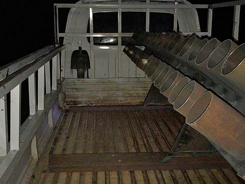 A rocket-rigged truck launcher after a rocket attack on Camp Taji.