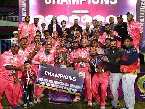 Friends Kuwait team that won the third edition of the 10PL tennis ball cricket tournament at the Sharjah Cricket Stadium