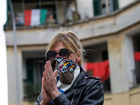 Italians sing out from balconies during coronavirus lockdown