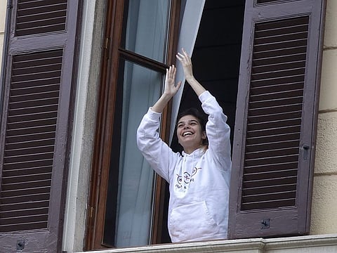 Italians sing out from balconies during coronavirus lockdown