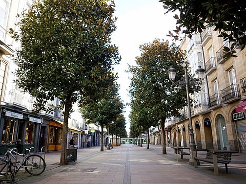 A tram crosses a virtually deserted street in the Basque city of Vitoria, Spain, on March 14.