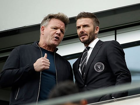 David Beckham talks with celebrity chef Gordon Ramsey at an Inter Miami match