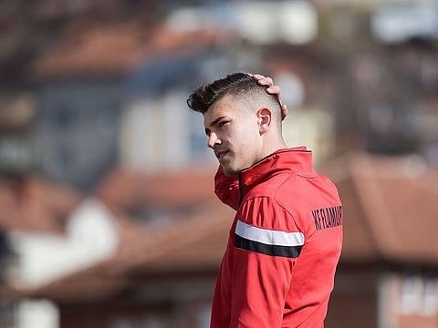 Serbian football player Ilija Ivic, 16, takes part in a training session in Pristina