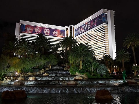 LAS VEGAS, NEVADA - MARCH 14: Building wraps for the The Beatles LOVE by Cirque du Soleil show are shown on the exterior of The Mirage Hotel & Casino as the coronavirus continues to spread across the United States on March 14, 2020, in Las Vegas, Nevada. Cirque du Soleil announced that it is temporarily suspending all six of its Las Vegas shows beginning tomorrow as well as around the world to help stop the spread of the virus. Several employees at MGM Resorts International, which owns The Mirage, have tested presumptive positive for COVID-19. MGM Resorts International employees who can will start working from home next week. MGM has closed all nightclubs, dayclubs, buffets, spas, gyms and salons at its properties in Las Vegas and on Monday, it will close 150 food and beverage outlets and furloughs and layoffs will begin. The World Health Organization declared the coronavirus (COVID-19) a global pandemic on March 11th. Ethan Miller/Getty Images/AFP
== FOR NEWSPAPERS, INTERNET, TELCOS & TELEVISION USE ONLY