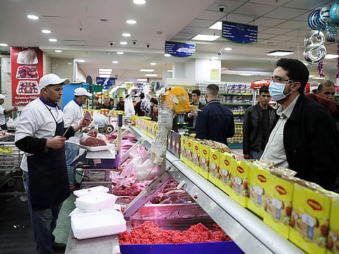 People shop in a mall amid concerns over the coronavirus spread in Amman, Jordan, March 15, 2020.