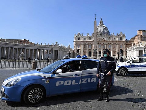 A police officer near the St. Peter's Square, on the sixth day of an unprecedented lockdown across of all Italy imposed to slow the outbreak of coronavirus in Rome, on March 15, 2020.