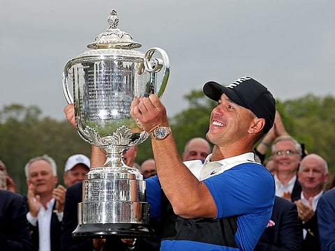 Brooks Koepka celebrates with the Wanamaker trophy after winning the PGA Championship at Bethpage State Park, Black Course last year. The event stands cancelled with the Coronavirus pandemic playing havoc with the sporting world.