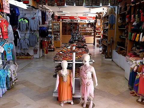An empty shop is pictured in Hammamet, Tunisia March 12, 2020.