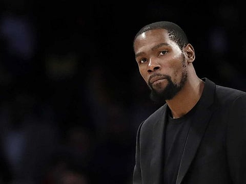 Brooklyn Nets' Kevin Durant is among the four Brooklyn Nets who have tested positive for the new coronavirus.