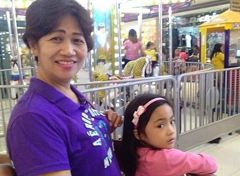 Erlinda Bolivar Leobrera with her grand daughter