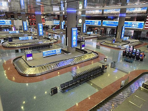 The nearly empty baggage claim area at McCarran International Airport as the coronavirus continues to spread across the United States on March 19, 2020 in Las Vegas, Nevada. On Tuesday, Nevada Gov. Steve Sisolak announced a statewide closure of all nonessential businesses, including all hotel-casinos on the Las Vegas Strip, for at least 30 days to help combat the spread of the virus.