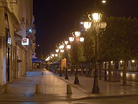 This picture taken on March 19, 2020 shows a view of the empty Avenue Habib Bourguiba in the centre of Tunisia's capital Tunis, as a daily curfew goes into effect.