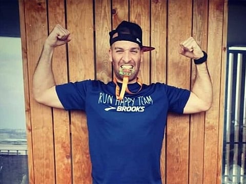 Elisha Nochomovitz figured out a way to run a marathon anyway - back and forth on his balcony