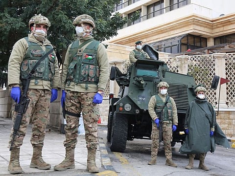 Jordanian soldiers keep watch in the capital Amman as Jordan takes measures to fight the spread of the coronavirus.