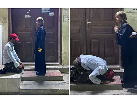 The images went viral online showing the man in worship positions in front of the girl next to a mosque in emulation of the Islamic prayer.