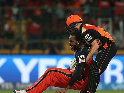 Chris Gayle (left) and David Warner, two of the most destructive batsmen in the game, during a lighthearted moment in the IPL last year.