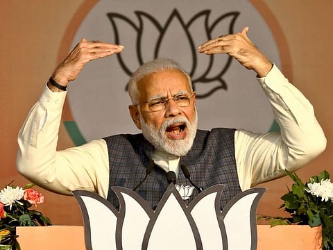 Narendra Modi addresses his BJP's campaign rally ahead of Delhi state elections in New Delhi on February 3.