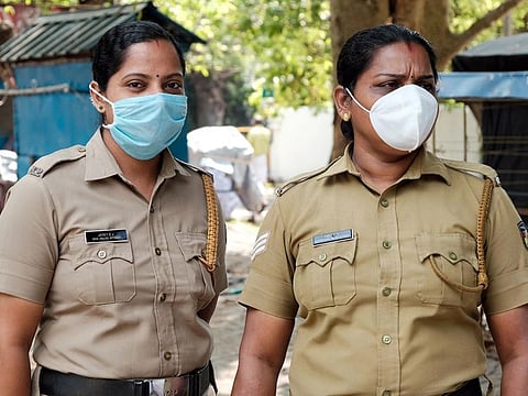 Women police personnel wear face masks as a preventive measure against the spread of COVID-19 novel coronavirus in Kochi on Saturday.