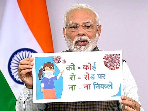 Indian Prime Minister Narendra Modi addresses the nation on COVID-19, in New Delhi on Tuesday. India ordered a 21-day lockdown of its 1.3 billion people to prevent the spread of the coronavirus.