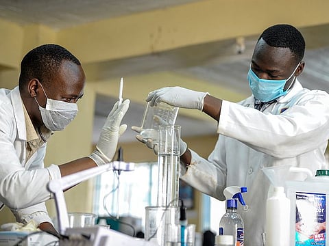 Laboratory technicians from Mount Kenya University produce hand sanitizer gel from locally-produced alcohol in response to the scarcity of such products as a result of high demand due to the new coronavirus, for use by the tens of thousands of university students and staff in its campuses across the country, in Thika, north of the capital Nairobi, in Kenya.