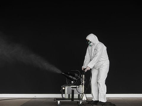 A municipal worker disinfects a warehouse to stop the spread of coronavirus disease (COVID-19) in Cascais, Portugal March 27, 2020
