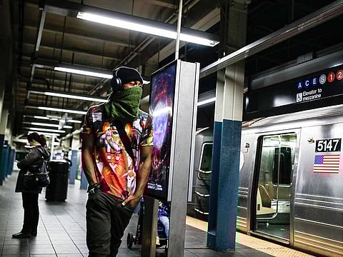 A subway customer walks a sparsely populated 42nd Street Times Square platform while covering his face due to coronavirus concerns in New York. Los Angeles is half the size of New York City but has a disproportionately small fraction of the coronavirus cases and deaths as the nation's largest city. The same goes for California when compared with New York state as a whole, which is the current epicentre of the outbreak in the US.