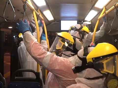 A public transport bus in Dubai being disinfected overnight during the National Sterilisation Drive to fight COVID-19 in the UAE.