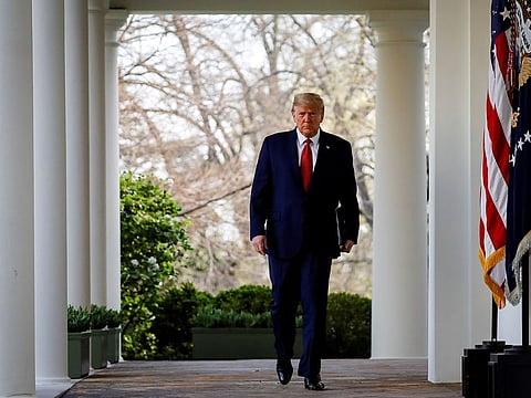 U.S. President Donald Trump arrives during a news conference in the Rose Garden of the White House in Washington, U.S., March 29, 2020.