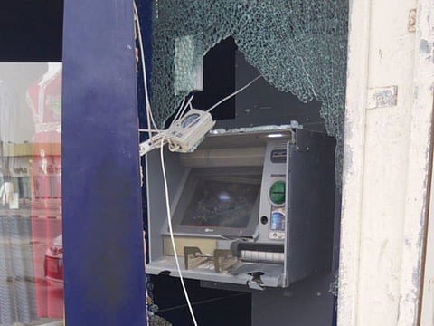 Police pictures of damaged cash machine in Ajman
